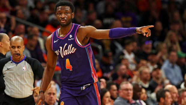 Phoenix Suns forward Chimezie Metu (4) celebrates after a play during the first quarter against the LA Clippers at Footprint Center.